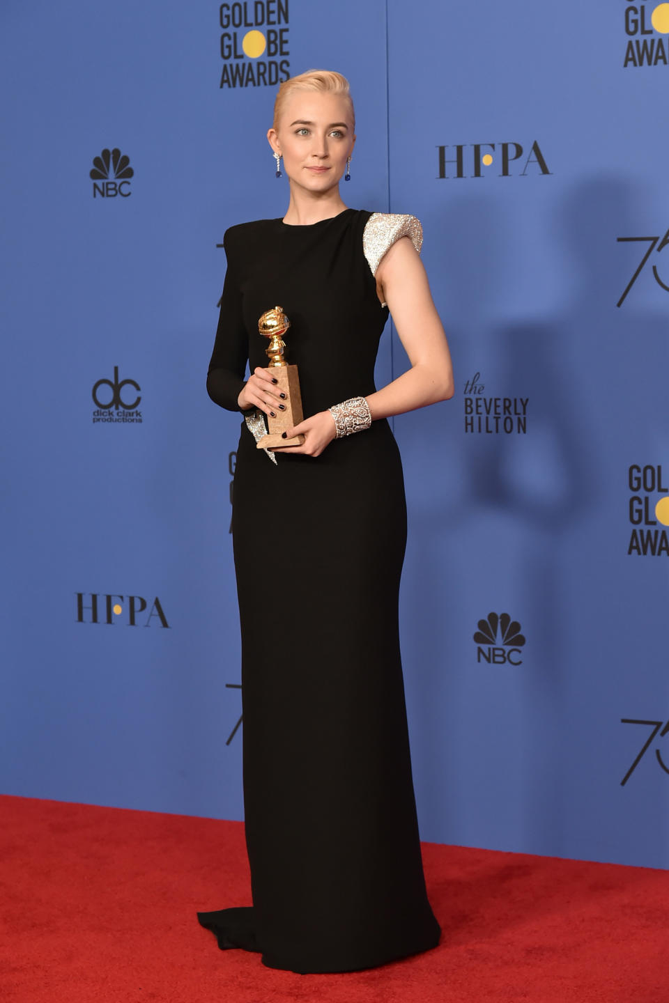 The "Lady Bird' star wears a Versace dress at the 75th Golden Globe Awards on Jan. 7 in Beverly Hills.