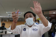 Bangkok governor independent candidate Asawin Kwanmuang introduces himself during an election campaign in Bangkok, Thailand, Tuesday, May 17, 2022. Residents of the Thai capital Bangkok will cast their ballots for the city’s leader Sunday in a vote seen as a barometer of the public mood ahead of an approaching general election. (AP Photo/Sakchai Lalit)