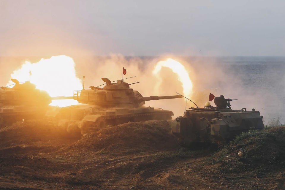 In this photo released by the Taiwan Military News Agency, Taiwan armored units conducts a live firing drill to deter a coastal landing force during the Han Guang exercise held on the island of Penghu county, Taiwan, Wednesday, Sept. 15, 2021. Taiwan's annual five-day Han Guang military exercise is designed to prepare the island's forces for an attack by China, which claims Taiwan as part of its own territory. (Military News Agency via AP)