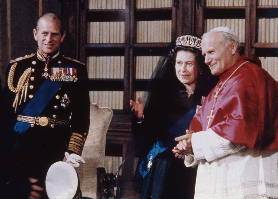 <p>Queen Elizabeth made history yet again in 1980 when she became the very first British monarch to visit the Vatican, meeting Pope John Paul II. </p>
