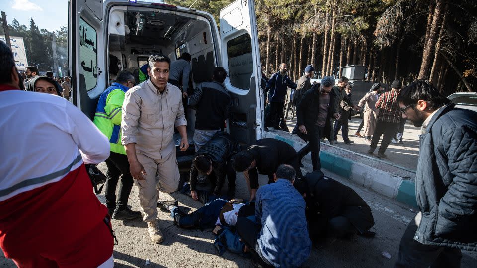 Iranian emergency services arrive at the site where two explosions in quick succession struck a crowd marking the anniversary of the 2020 killing of Qasem Soleimani, near the Saheb al-Zaman Mosque in the southern Iranian city of Kerman on Wednesday. - MEHR NEWS/AFP/Getty Images