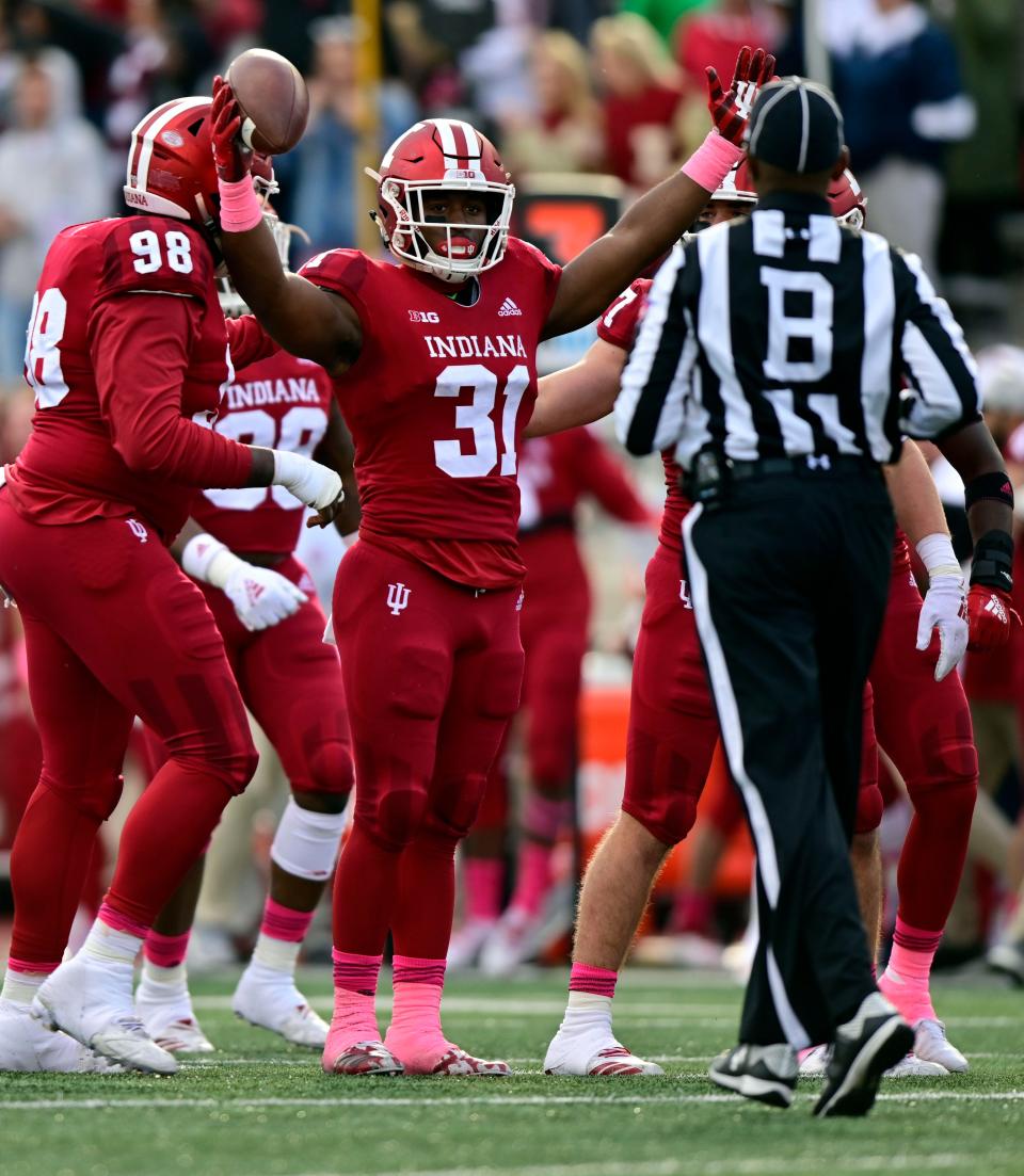 Indiana Hoosiers defensive back Bryant Fitzgerald (31) celebrates after intercepting the ball during the second quarter of the game against the Penn State Nittany Lions at Memorial Stadium