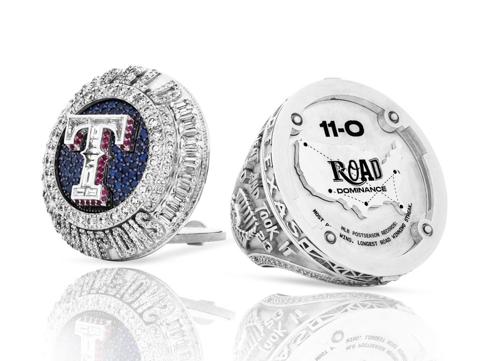The Texas Rangers World Series championship ring commemorates their 11-0 record on the road in the postseason.