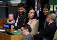 New Zealand Prime Minister Jacinda Ardern sits with her baby Neve after speaking at the Nelson Mandela Peace Summit during the 73rd United Nations General Assembly in New York, U.S., September 24, 2018. REUTERS/Carlo Allegri