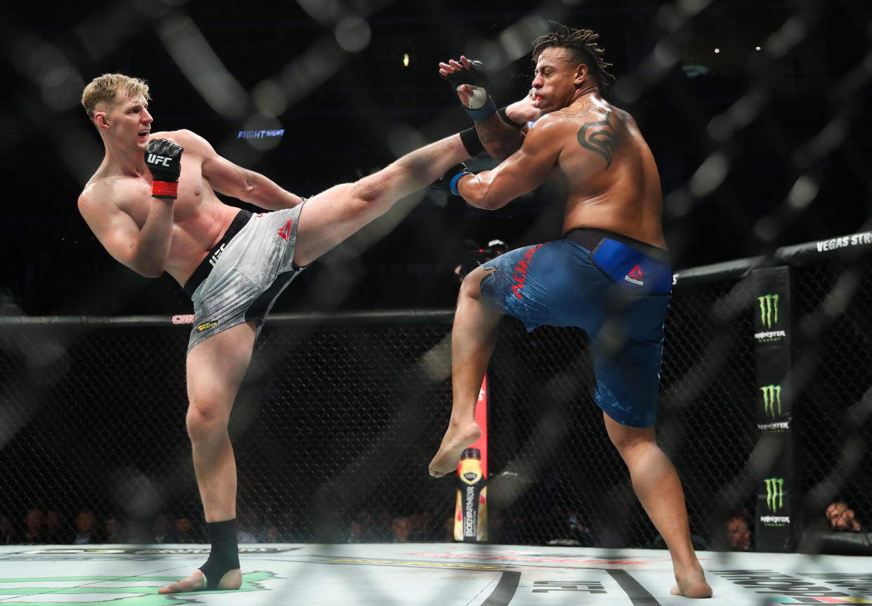 MOSCOW, RUSSIA  NOVEMBER 10, 2019: UFC heavyweight fighters Greg Hardy (R) of the United States and Alexander Volkov of Russia in a bout as part of the UFC Fight Night 163 mixed martial arts event, at CSKA Arena. Valery Sharifulin/TASS (Photo by Valery Sharifulin\TASS via Getty Images)