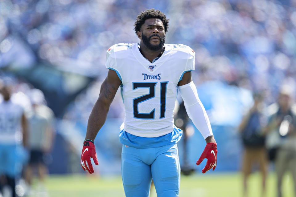 NASHVILLE, TN - SEPTEMBER 15:  Malcolm Butler #21 of the Tennessee Titans greets teammates running onto the field before a game against the Indianapolis Colts at Nissan Stadium on September 15, 2019 in Nashville,Tennessee.  The Colts defeated the Titans 19-17.  (Photo by Wesley Hitt/Getty Images)