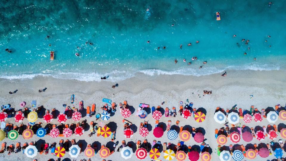 22 Best Beach Umbrellas That Won’t Fly Away While You’re Relaxing