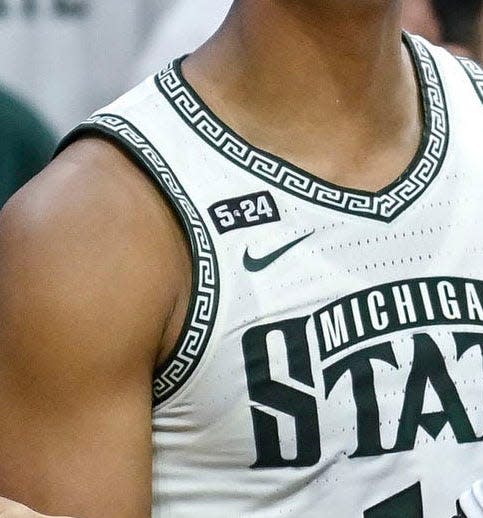 The Michigan State men's basketball team has worn a patch with the numbers "5" and "24" across its right shoulder all season long to honor two former players who died in 2022.