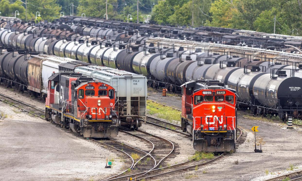 <span>Lockouts have begun at Canadian National Rail and Canadian Pacific Kansas City, which say their offers to workers are competitive.</span><span>Photograph: Carlos Osorio/Reuters</span>