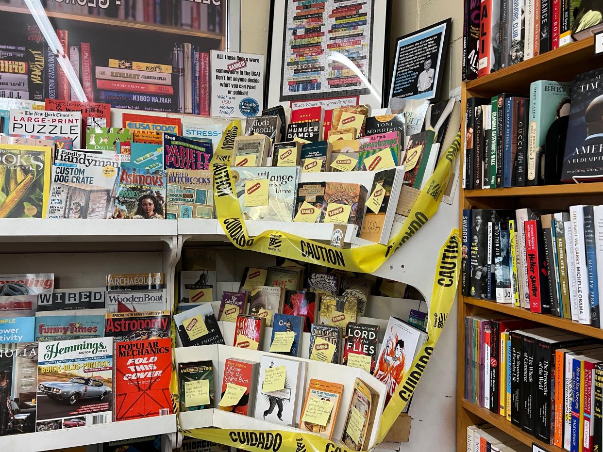 Daytona Beach city commissioners got into a tense discussion Wednesday night over a book giveaway earlier this month. Pictured are banned books that were on display at the Family Book Shop in DeLand in July.