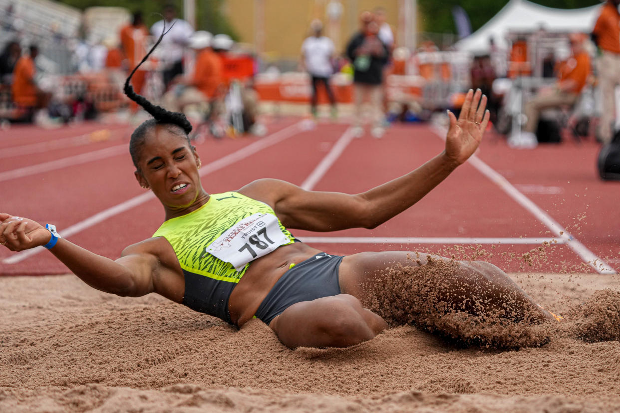 Former Texas standout Tyra Gittens, now a professional competing for PUMA, makes an attempt in the women's long jump Saturday at Mike A. Myers Stadium, on the final day of the Texas Relays. She was making her professional debut in the event.