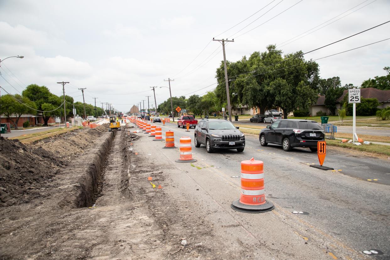 Construction crews work on Staples Street from Brawner Parkway to Kostoryz Road on Tuesday, July 23, 2019.