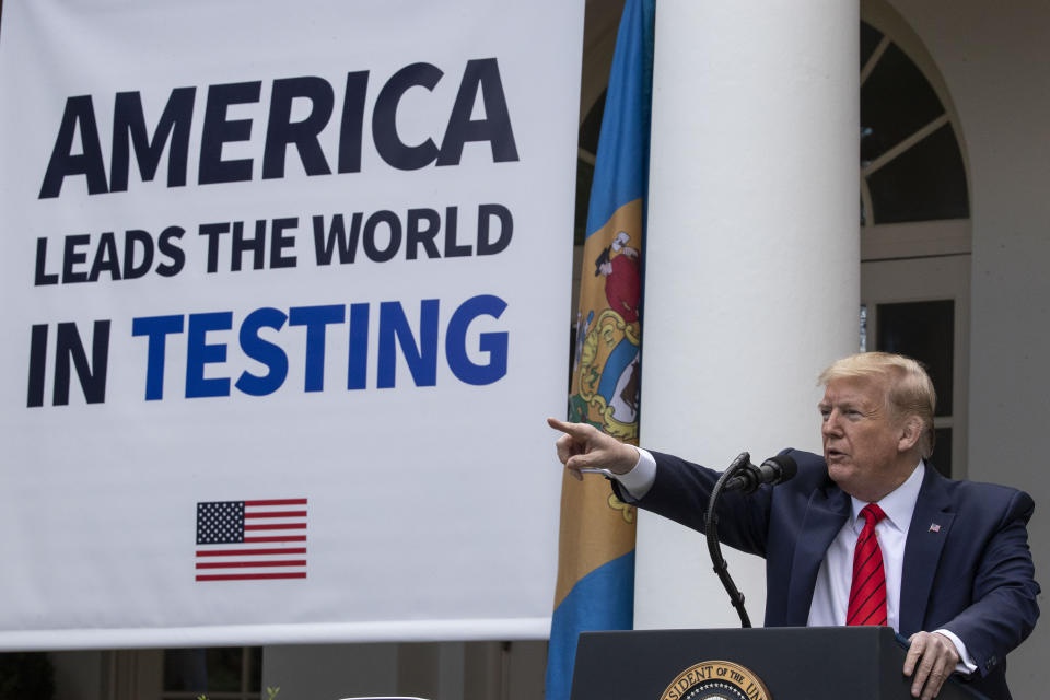 President Donald Trump points to a question as he speaks about the coronavirus during a press briefing in the Rose Garden of the White House, Monday, May 11, 2020, in Washington. (AP Photo/Alex Brandon)