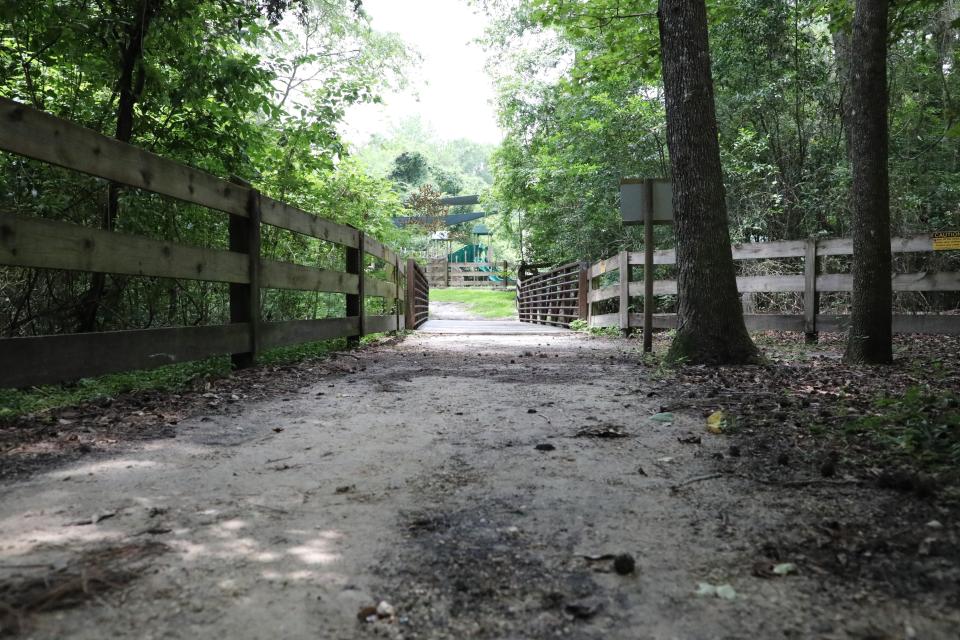 A bridge over Beville Creek leading to the playground at Cofrin Nature Park in Gainesville, Florida on June 26, 2023.