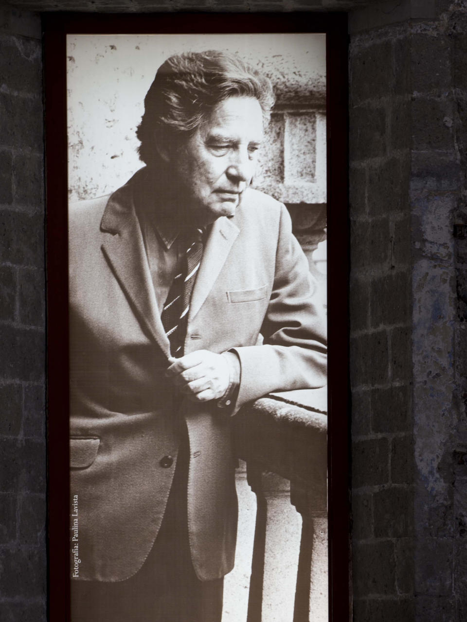 A photo of Mexican Nobel Prize poet and essayist Octavio Paz covers a wall at an exhibit marking the 100th anniversary of his birth in Mexico City, Monday, March 31, 2014. Mexico's government and top poets are holding readings and exhibitions to remember Paz, whose most famous work was the 1950 essay "The Labyrinth of Solitude." Paz died 16 years ago. (AP Photo/Eduardo Verdugo)