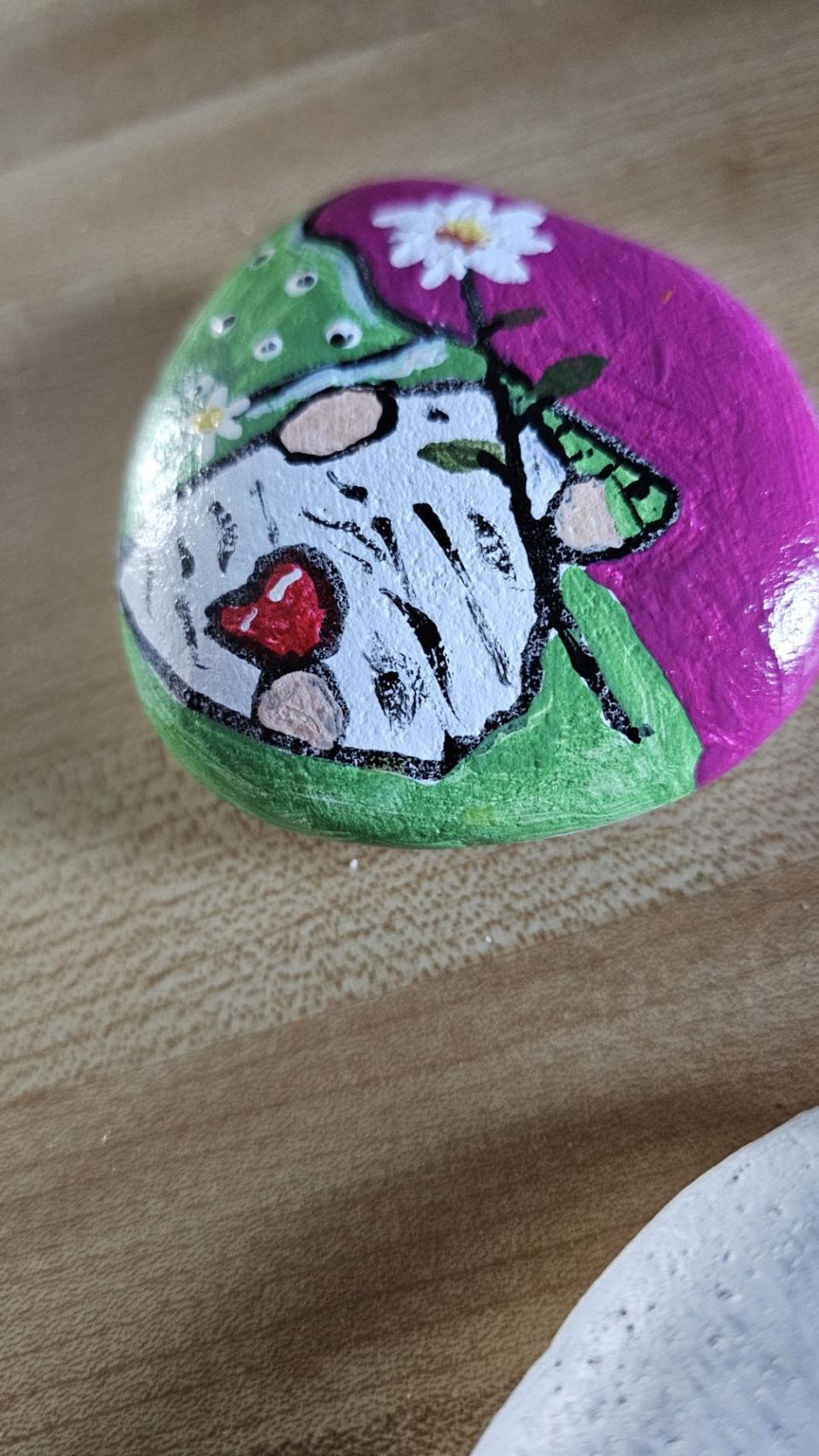 Diane Ford painted several heart-themed rocks, like this one with a gnome, for Valentine's Day.