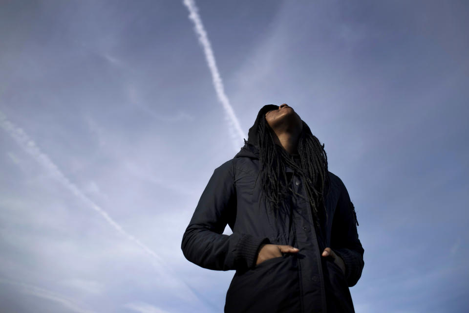 A survivor of sexual assault meditates in the Brooklyn borough of New York on Thursday, March 14, 2019. The young woman seeks peace through meditation. She said that she was assaulted by someone she knew but never reported it because she feared she wouldn’t be believed. (AP Photo/Wong Maye-E)