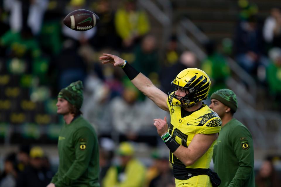 Oregon quarterback Bo Nix throws out a pass while warming up as the No. 6 Oregon Ducks host the No. 24 Washington Huskies on Nov. 12 at Autzen Stadium in Eugene.