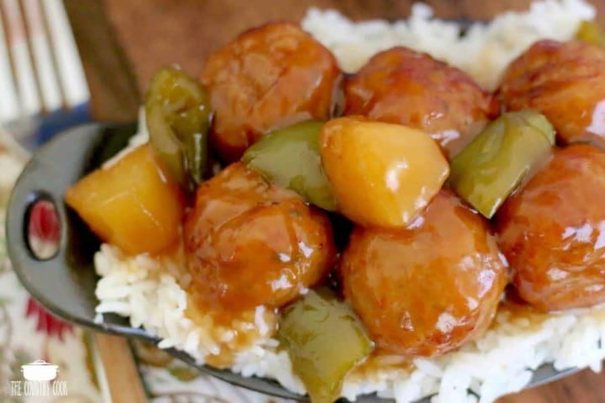 <p>The Country Cook</p><p>Meatballs, pineapple and peppers coated in a homemade sweet and sour sauce.</p><p><strong>Get the recipe: <a href="https://www.thecountrycook.net/crock-pot-sweet-sour-meatballs/" rel="nofollow noopener" target="_blank" data-ylk="slk:Crock Pot Sweet and Sour Meatballs;elm:context_link;itc:0;sec:content-canvas" class="link rapid-noclick-resp">Crock Pot Sweet and Sour Meatballs</a></strong></p>