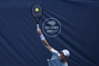 Kyle Edmund, of Britain, serves during a first round match against Yosuke Watanuki, of Japanm at the Citi Open tennis tournament in Washington, Monday, Aug. 1, 2022. (AP Photo/Carolyn Kaster)