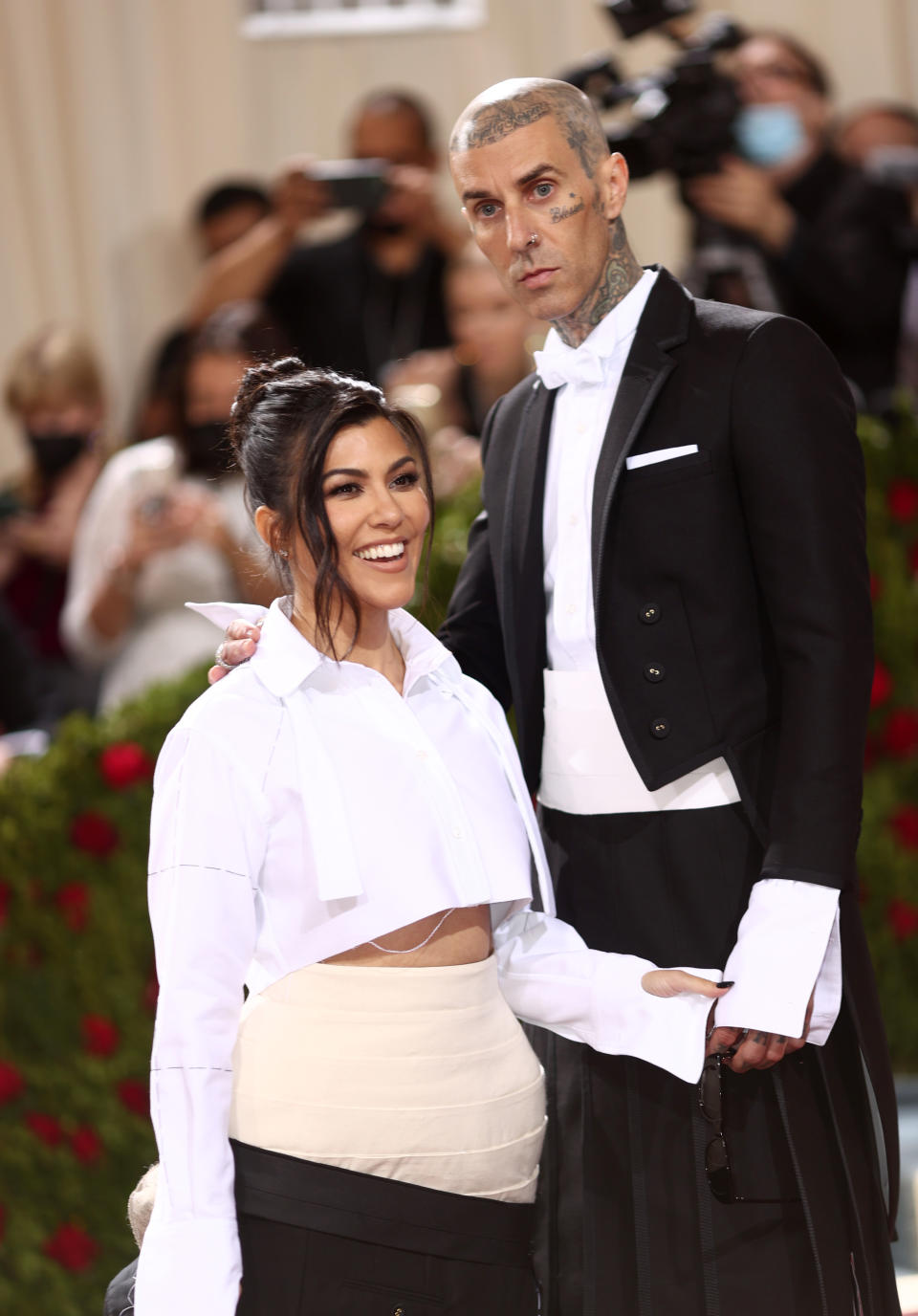 Kourtney Kardashian and Travis Barker wear Thom Browne at the 2022 Met Gala celebrating In America: An Anthology of Fashion. The annual event was held at the The Metropolitan Museum of Art in New York on May 2, 2022. (Photo by Chris Polk/WWD/Penske Media via Getty Images)