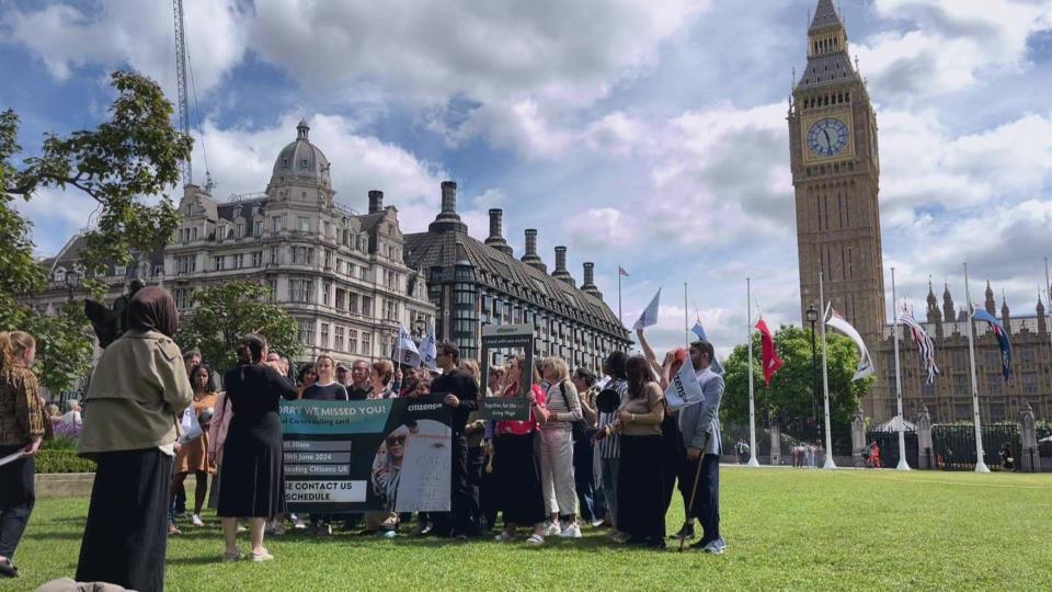 Suzie Lyle and other carers campaigning for reform outside the Houses of Parliament