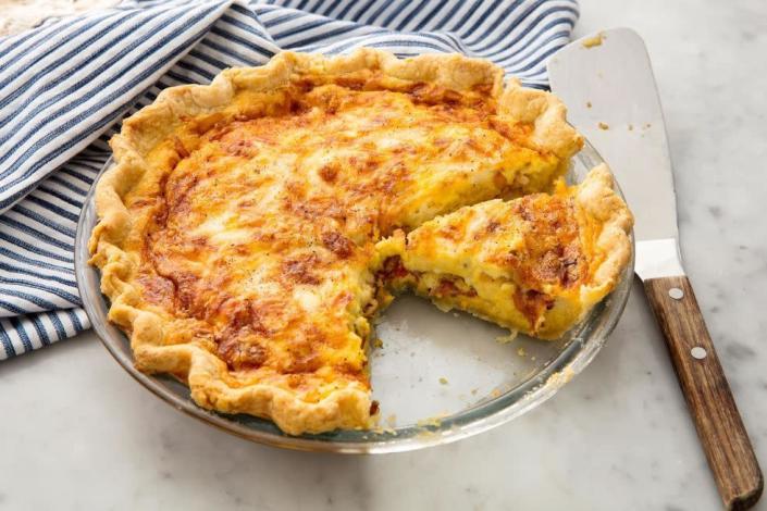 <p>Once you master this classic recipe, there's no quiche you can't make. <a href="https://www.delish.com/cooking/recipe-ideas/a19635987/easy-basic-breakfast-quiche-recipe/" rel="nofollow noopener" target="_blank" data-ylk="slk:Spinach artichoke" class="link ">Spinach artichoke</a>? <a href="https://www.delish.com/cooking/recipe-ideas/a19635987/easy-basic-breakfast-quiche-recipe/" rel="nofollow noopener" target="_blank" data-ylk="slk:Caprese" class="link ">Caprese</a>? BOTH PLEASE!<br><br>Get the <strong><a href="https://www.delish.com/cooking/recipe-ideas/recipes/a58388/easy-quiche-lorraine-recipe/" rel="nofollow noopener" target="_blank" data-ylk="slk:Quiche Lorraine recipe" class="link ">Quiche Lorraine recipe</a></strong>. </p>