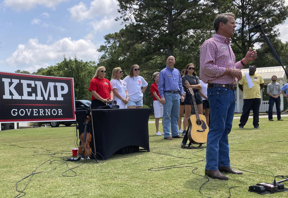 Georgia Gov. Brian Kemp speaks at a get-out-the-vote rally on Saturday, May 21, 2022, in Watkinsville, Ga. Kemp is seeking to beat former U.S. Sen David Perdue and others in a Republican primary for governor on Tuesday, May 24. (AP Photo/Jeff Amy)