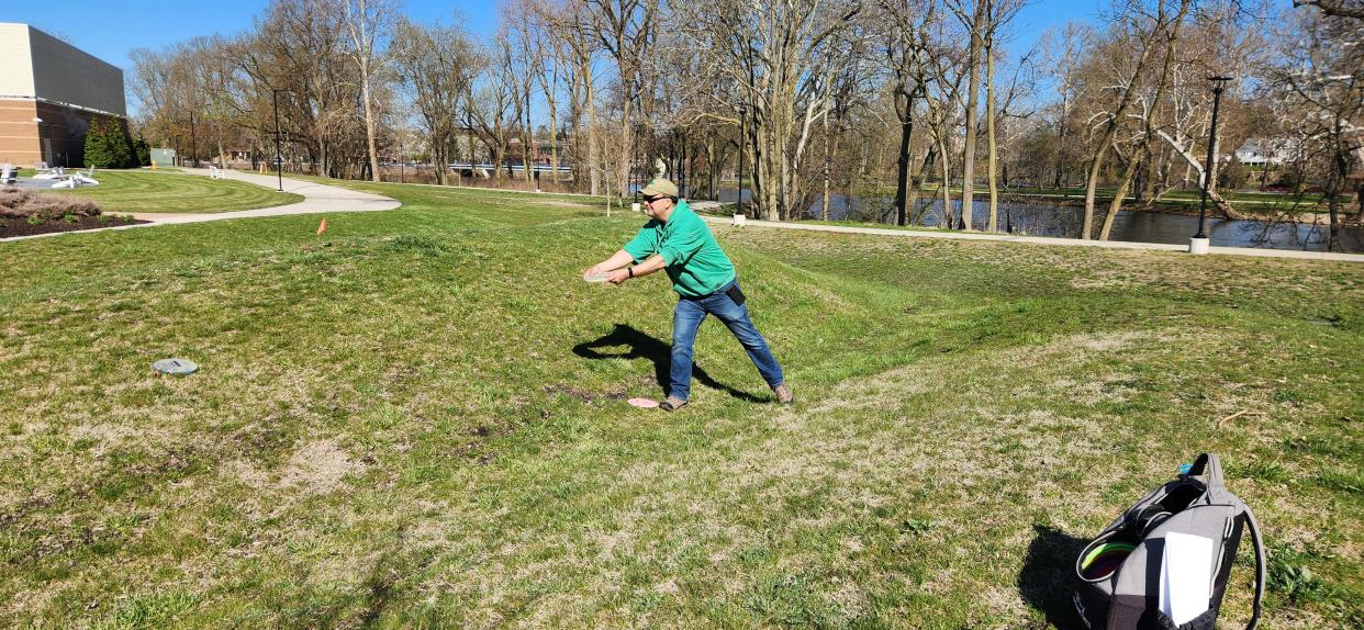 The city of Elkhart's parks department is designing a disc golf course that it hopes to make a permanent fixture in downtown near trails, as seen here in spring 2024.