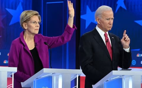 Elizabeth Warren and Joe Biden are the two front-runners in the race to take on Donald Trump in the November 2020 election - Credit: SAUL LOEB / AFP