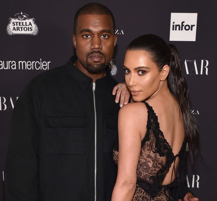 Kanye West and Kim Kardashian are getting pumped up by Tony Robbins together. (Photo: Bryan Bedder/Getty Images for Harper’s Bazaar)