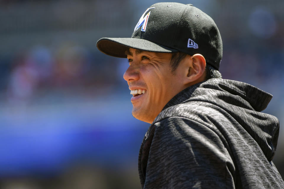 WASHINGTON, DC - JULY 08:  Miami Marlins starting pitcher Wei-Yin Chen (54) smiles in the dugout during the game between the Miami Marlins and the Washington Nationals on July 8, 2018, at Nationals Park, in Washington D.C.  (Photo by Mark Goldman/Icon Sportswire via Getty Images)