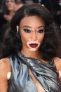 <p>Winnie Harlow went for bombshell glamour, with full-bodied Old Hollywood waves, defined cat eyes and berry red lips. </p>