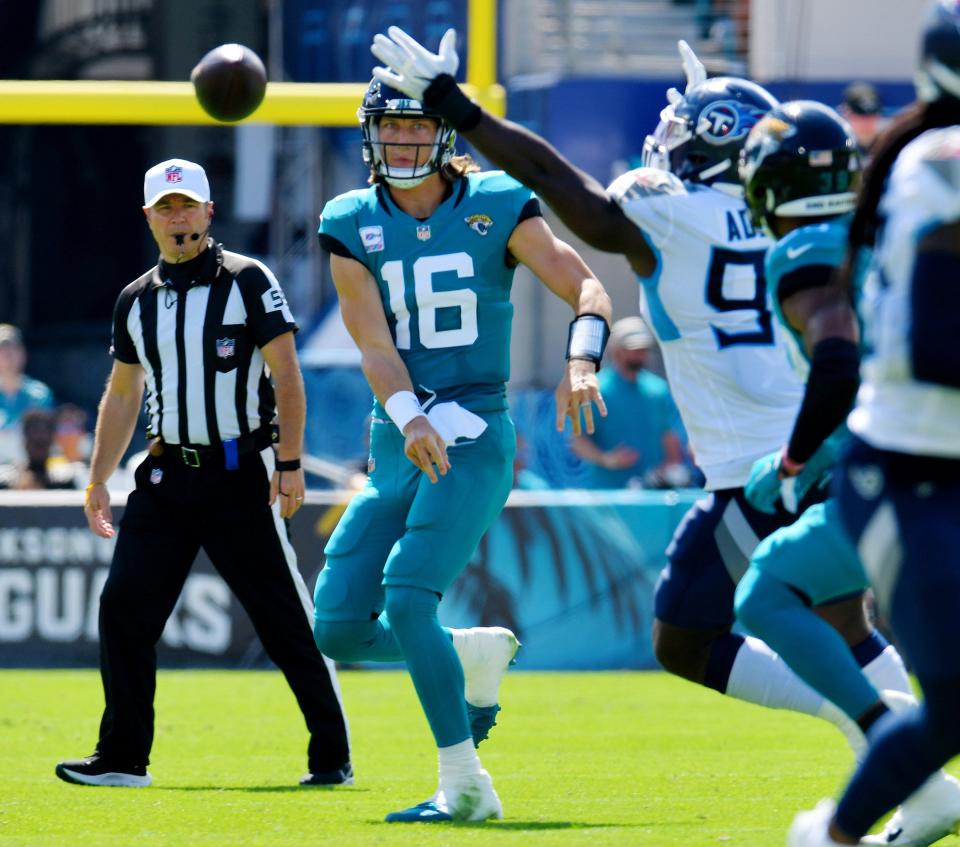 Jacksonville Jaguars quarterback Trevor Lawrence (16) throws a pass against the Tennessee Titans on Oct. 10, 2021.