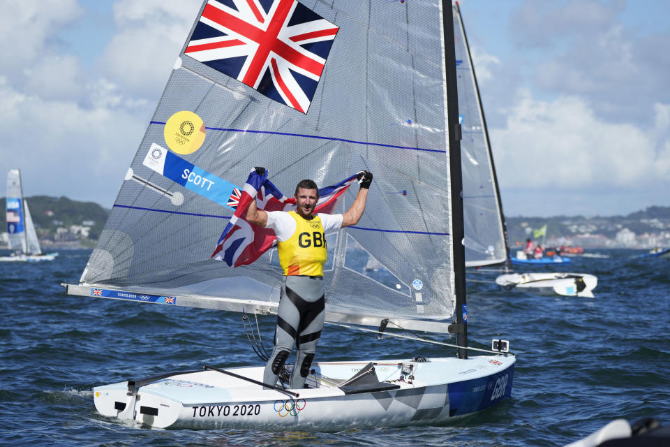 Giles Scott celebrates winning gold 