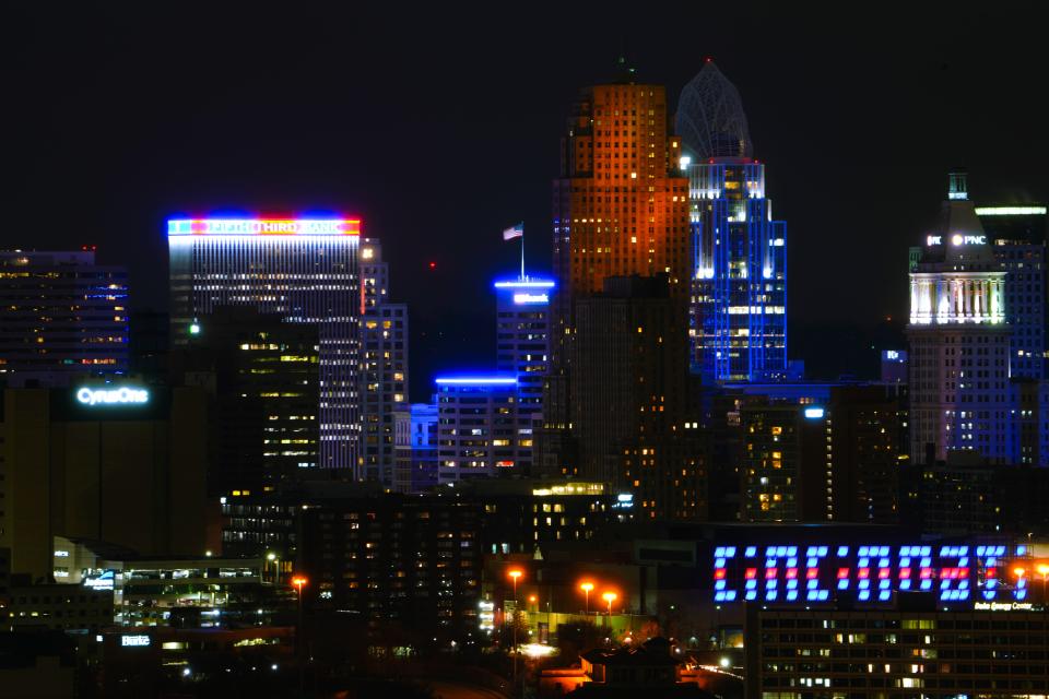 The high-rise buildings of Downtown Cincinnati were lit blue and red in recognition of Buffalo Bills safety Damar Hamlin, Tuesday, Jan. 3, 2023. Hamlin suffered cardiac arrest midway through the first quarter of a Week 17 NFL game at the Cincinnati Bengals, and was revived on the field prior to being taken to University of Cincinnati Medical Center. Game play was suspended and has not been rescheduled. 