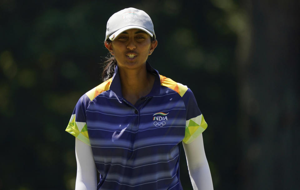 Aditi Ashok, of India, gestures on the 5th hole during the third round of the women's golf event at the 2020 Summer Olympics, Friday, Aug. 6, 2021, at the Kasumigaseki Country Club in Kawagoe, Japan. (AP Photo/Matt York)