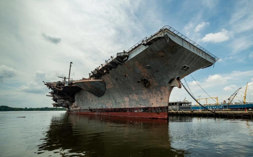 A side view of the decommissioned ship USS John F. Kennedy