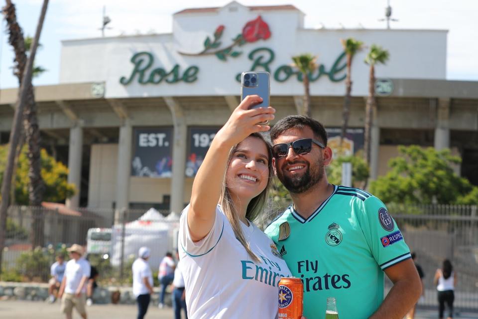 Real Madrid fans take selfie before Saturday's match between Real Madrid and Juventus at the Rose Bowl.