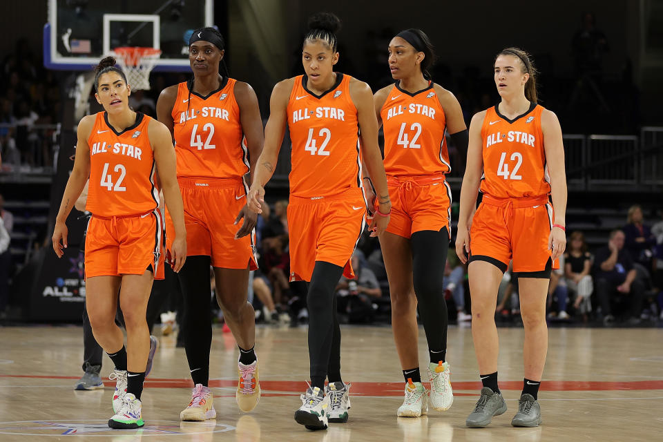 Team Wilson All-Stars Kelsey Plum, Sylvia Fowles, Candace Parker, A'ja Wilson and Sabrina Ionescu wear jersey sporting Brittney Griner's No. 42 and her name on the back during the 2022 WNBA All-Star Game at the Wintrust Arena in Chicago on July 10, 2022. (Stacy Revere/Getty Images)