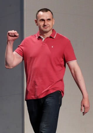 Ukrainian filmmaker Oleg Sentsov arrives for a news conference in Kiev