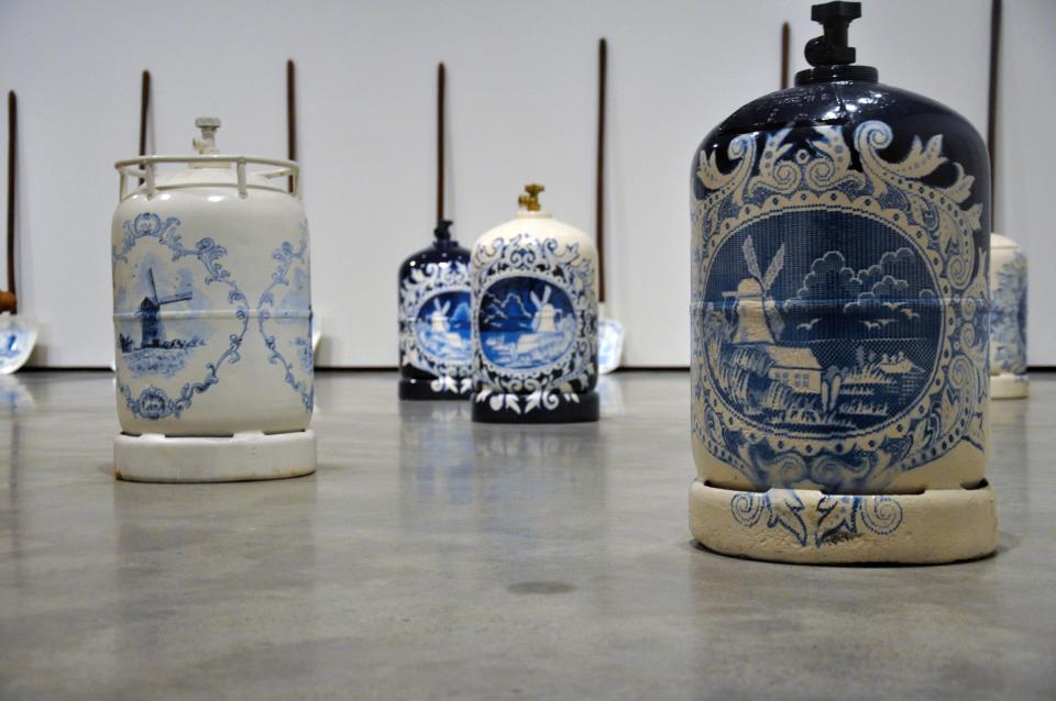 <p><b>Gas Canisters</b></p> Just like the magic he uses on the Delft Shovels, Wim Delvoye casts a charm on gas canisters and turns them into things of arresting beauty.