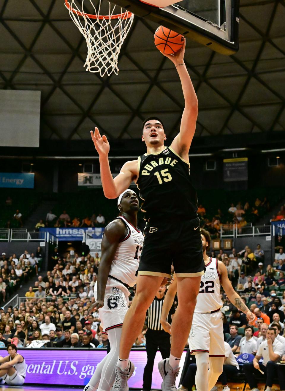 Nov 20, 2023; Honolulu, Hawaii, USA; 

Purdue Boilermakers center Zach Edey (15) shoots a layup defended by Gonzaga Bulldogs forward Graham Ike (13) during the first half at SimpliFi Arena at Stan Sheriff Center. Mandatory Credit: Steven Erler-USA TODAY Sports