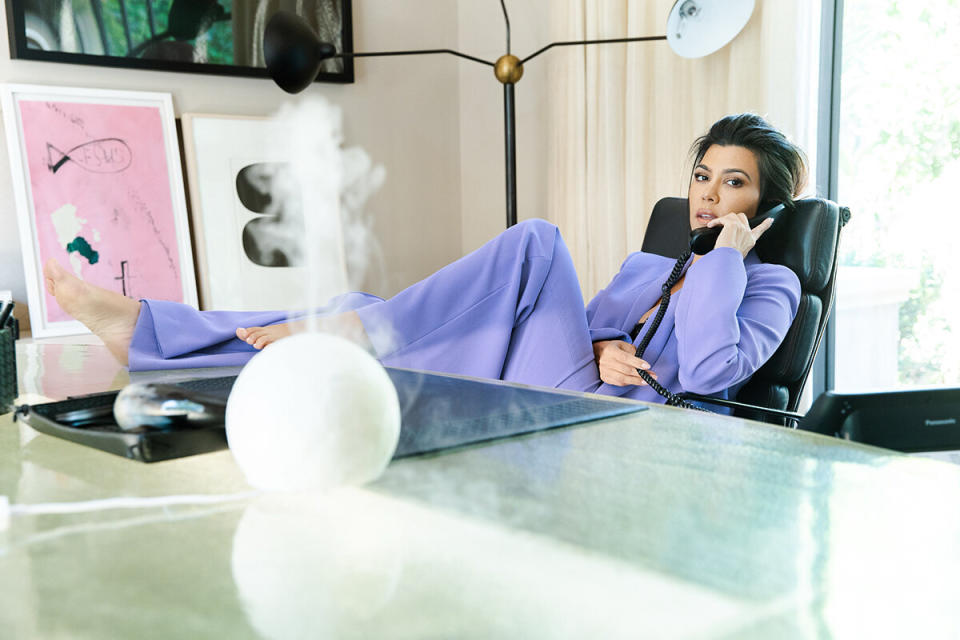 One key to a good celebrity product photo is how the celeb treats the product they're pushing. Kourtney Kardashian obviously doesn't care if she accidentally kicks this <a href="https://shop.poosh.com/products/positively-poosh-ultrasonic-diffuser-kit-grey" target="_blank" rel="noopener noreferrer">diffuser</a> off her desk because she's a boss. However, she probably does care if you buy it. She just doesn't want to come across as desperate. Thank you for caring, Kourtney.