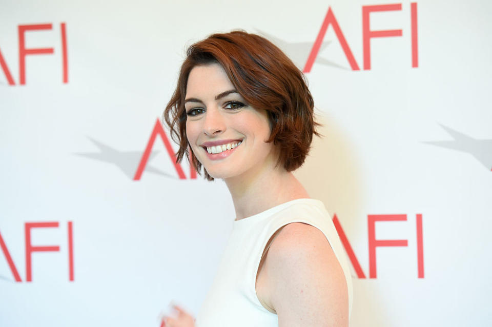 Anne Hathaway just talked about fitting back into her pre-pregnancy clothes in the most relatable way