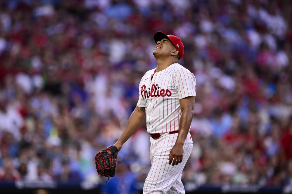 Philadelphia Phillies' Ranger Suárez reacts after he was hit by a ball from St. Louis Cardinals' Alec Burleson during the second inning of a baseball game, Saturday, June 1, 2024, in Philadelphia. (AP Photo/Derik Hamilton)