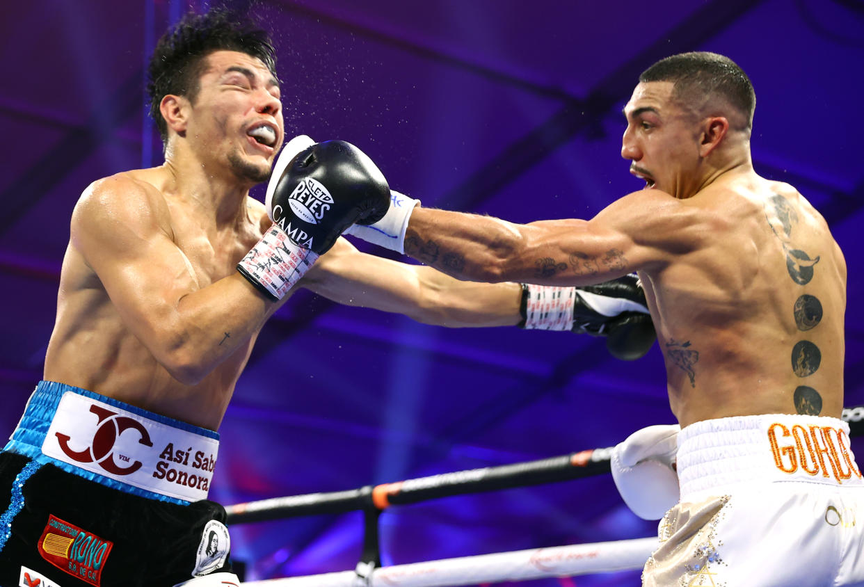 LAS VEGAS, NEVADA - AUGUST 13: Pedro Campa (L) and Teofimo Lopez (R) exchange punches during their NABF & WBO International junior welterweight fight at Resorts World Las Vegas on August 13, 2022 in Las Vegas, Nevada. (Photo by Mikey Williams/Top Rank Inc via Getty Images)