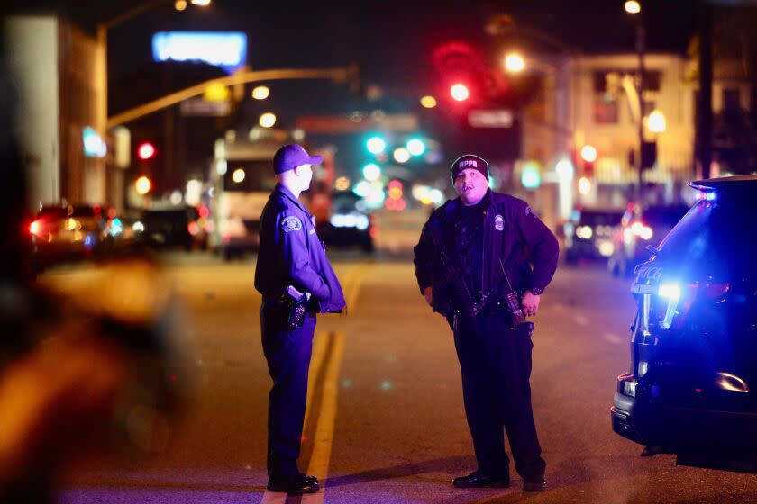 Monterey Park Police investigate the scene of a multiple murder scene on the 100 block of west Garvey Ave on Saturday Jan 22, 2023. in Monterey Park.