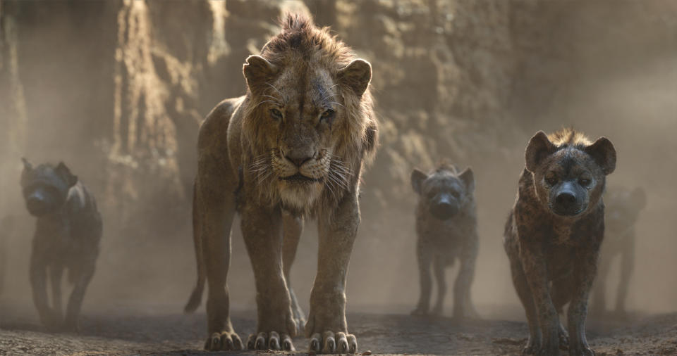 THE LION KING, center: Scar (voice: Chiwetel Ejiofor), hyenas (voices: Florence Kasumba, Eric Andre, Keegan-Michael Key), 2019. © Walt Disney Studios Motion Pictures / courtesy Everett Collection