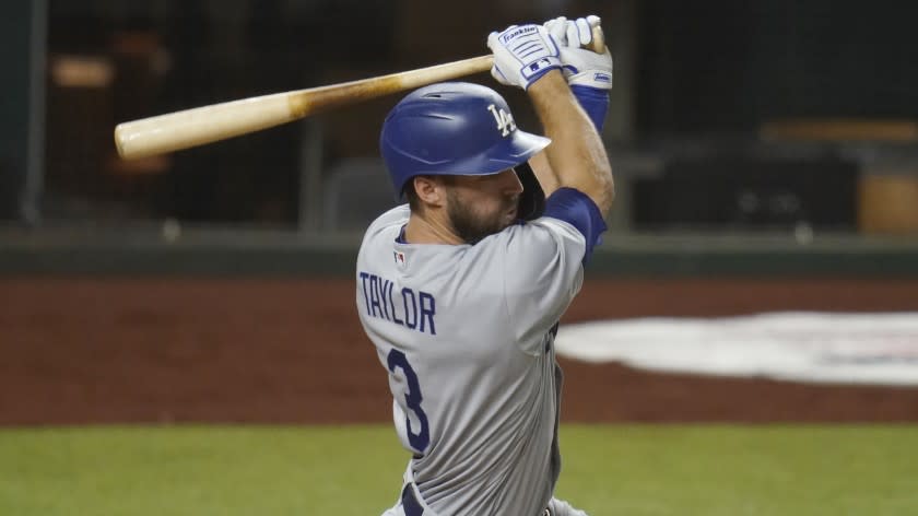 Los Angeles Dodgers' Chris Taylor bats in Game 3 of a baseball National League Division Series.